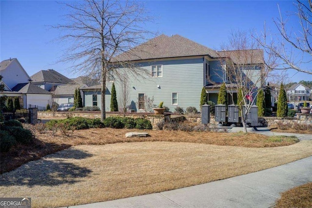 164 Inwood Walk, Woodstock, GA 30188 - view of property exterior with mail area and a residential view
