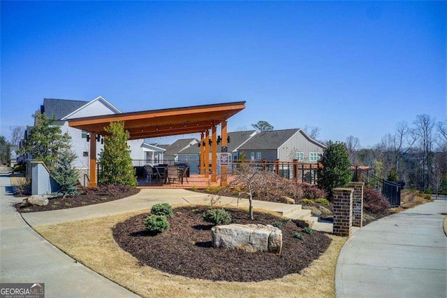 164 Inwood Walk, Woodstock, GA 30188 - view of home's community with a patio area and outdoor dining area