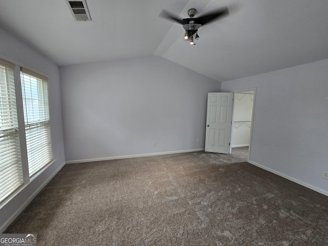 3613 Tinsley Way, Atlanta, GA 30331 - unfurnished bedroom with lofted ceiling, carpet floors, a spacious closet, and a ceiling fan
