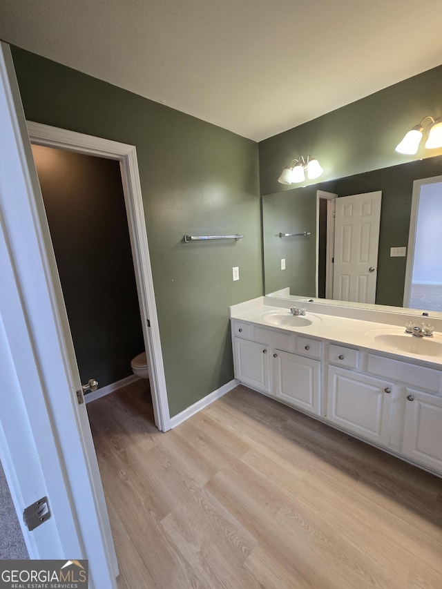 3613 Tinsley Way, Atlanta, GA 30331 - bathroom with double vanity and wood finished floors