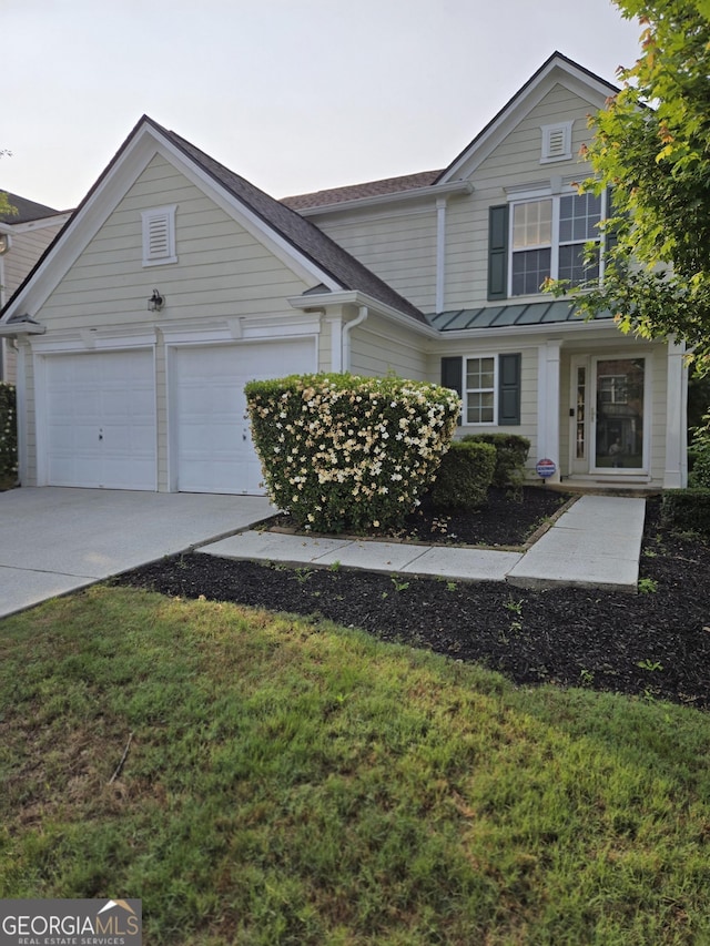 3613 Tinsley Way, Atlanta, GA 30331 - traditional-style house featuring concrete driveway, a standing seam roof, an attached garage, and a front yard