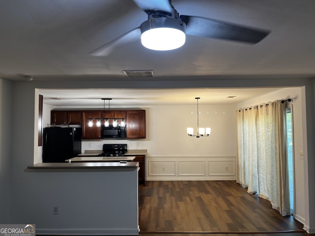 3613 Tinsley Way, Atlanta, GA 30331 - kitchen with black appliances, dark wood-type flooring, hanging light fixtures, a peninsula, and a chandelier