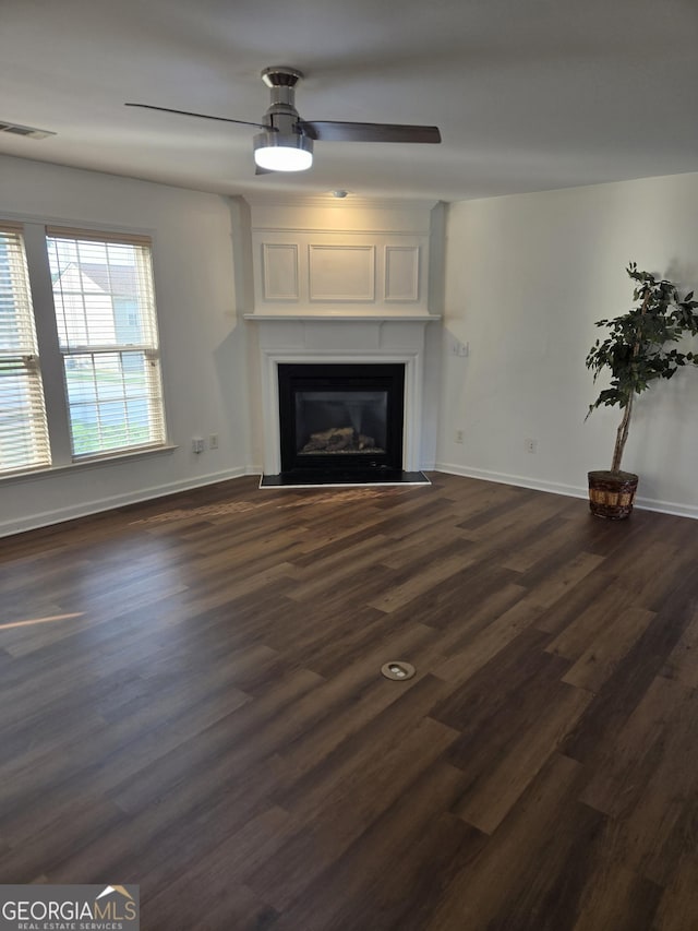 3613 Tinsley Way, Atlanta, GA 30331 - unfurnished living room with a ceiling fan, a glass covered fireplace, and dark wood finished floors