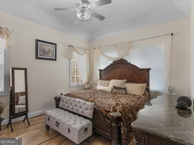 355 Parker Rd, Covington, GA 30014 - bedroom with light wood-type flooring and ceiling fan