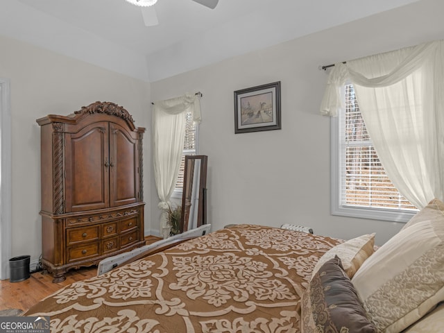 355 Parker Rd, Covington, GA 30014 - bedroom featuring multiple windows, wood finished floors, and ceiling fan