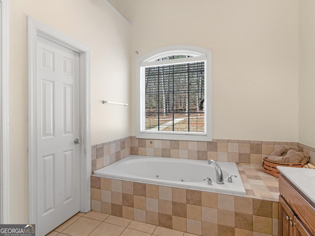 355 Parker Rd, Covington, GA 30014 - bathroom featuring vanity, a whirlpool tub, and tile patterned floors