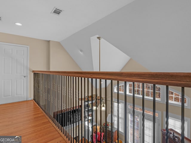 355 Parker Rd, Covington, GA 30014 - corridor with light wood finished floors, lofted ceiling, and recessed lighting