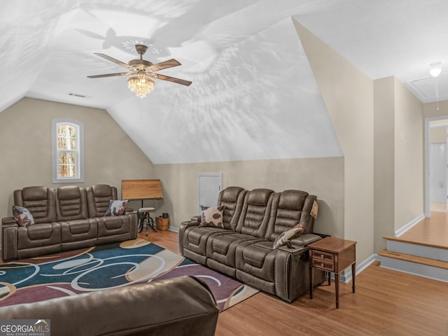 355 Parker Rd, Covington, GA 30014 - living area with attic access, wood finished floors, a ceiling fan, and lofted ceiling