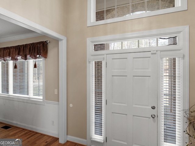 355 Parker Rd, Covington, GA 30014 - foyer entrance featuring baseboards and wood finished floors