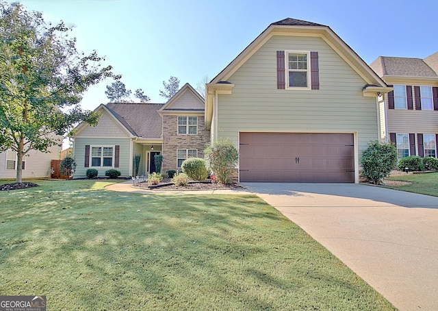 149 Horizon Hl, Newnan, GA 30265 - view of front of house with an attached garage, driveway, a front yard, and stone siding