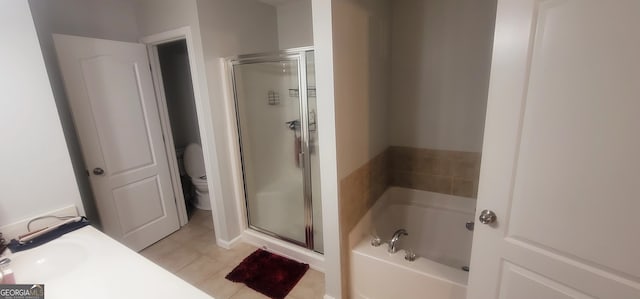 5719 Singlebriar Ct, Norcross, GA 30093 - bathroom featuring a shower stall, tile patterned floors, a bath, toilet, and vanity