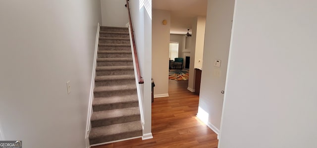 5719 Singlebriar Ct, Norcross, GA 30093 - stairway with wood finished floors, baseboards, and a fireplace
