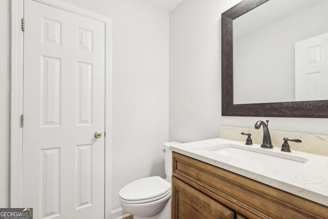 6230 Lillie Ln, Cumming, GA 30040 - bathroom with vanity and toilet