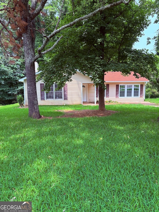 6103 Chaseland Rd, Rex, GA 30273 - view of front of property with a front lawn