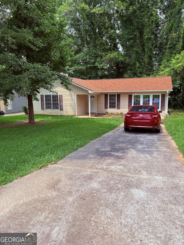6103 Chaseland Rd, Rex, GA 30273 - ranch-style home featuring driveway and a front lawn