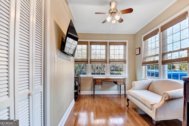 570 Southview Dr, Athens, GA 30605 - sitting room with wood-type flooring, ceiling fan, crown molding, and baseboards