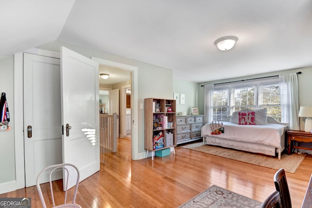 570 Southview Dr, Athens, GA 30605 - bedroom with light wood-style flooring and baseboards