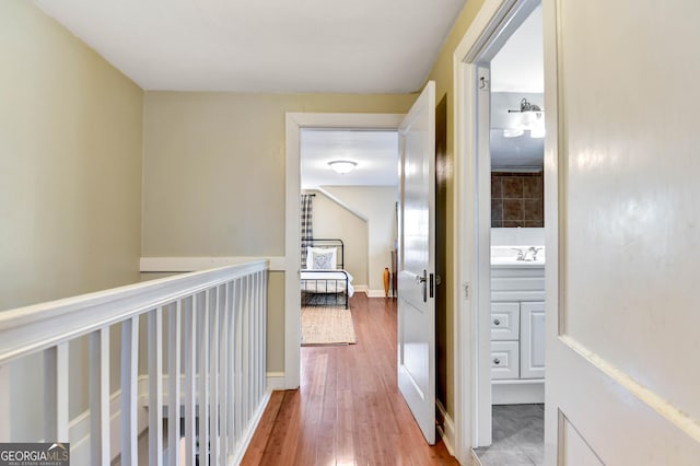 570 Southview Dr, Athens, GA 30605 - corridor featuring wood finished floors, a sink, and baseboards