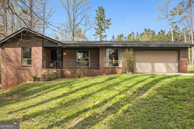 779 Pinehurst Dr, Fairburn, GA 30213 - ranch-style home featuring brick siding, an attached garage, and a front lawn