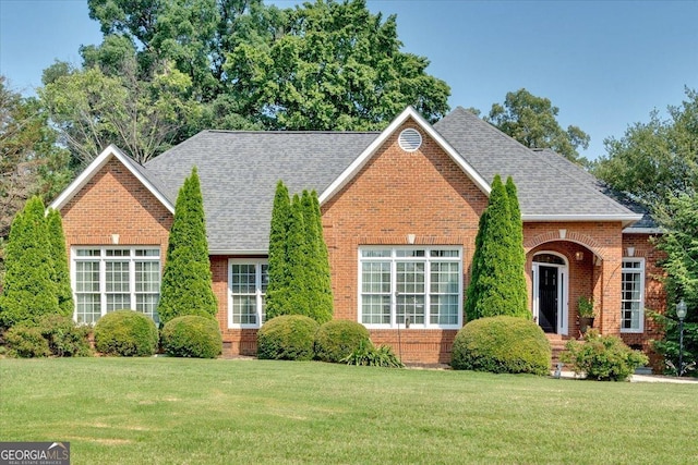 11 Crossbridge Ct, Cartersville, GA 30120 - view of front of house featuring a front yard, brick siding, and roof with shingles