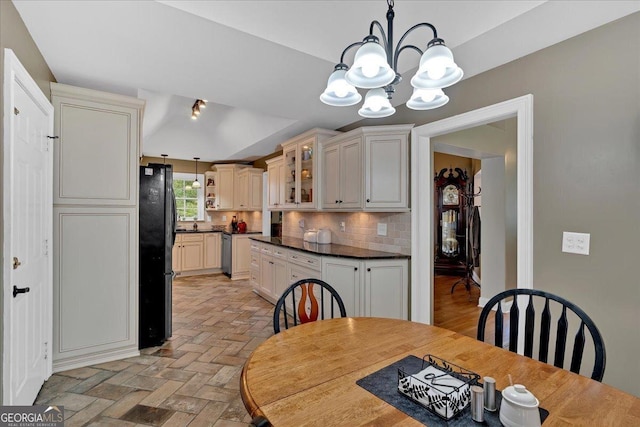 11 Crossbridge Ct, Cartersville, GA 30120 - dining area featuring a chandelier and brick patterned floors