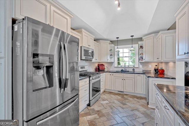 11 Crossbridge Ct, Cartersville, GA 30120 - kitchen with appliances with stainless steel finishes, open shelves, a sink, decorative backsplash, and lofted ceiling