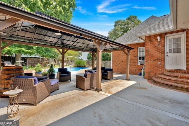 11 Crossbridge Ct, Cartersville, GA 30120 - fenced backyard with a gazebo, entry steps, outdoor lounge area, and a patio area