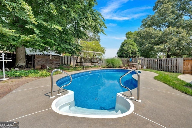 11 Crossbridge Ct, Cartersville, GA 30120 - view of swimming pool featuring a fenced backyard and a patio