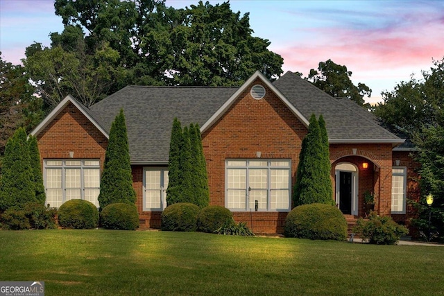 11 Crossbridge Ct, Cartersville, GA 30120 - view of front facade with a front yard, brick siding, and a shingled roof