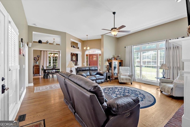 11 Crossbridge Ct, Cartersville, GA 30120 - living area featuring wood finished floors, a ceiling fan, and baseboards