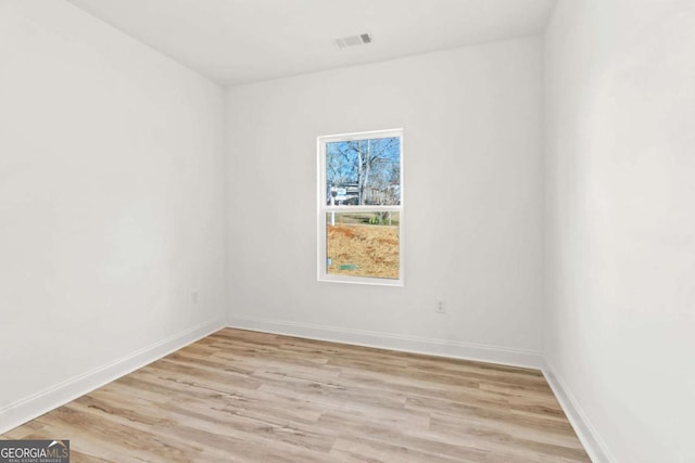 30 Moore Ave, Toccoa, GA 30577 - unfurnished room featuring light wood-style floors and baseboards