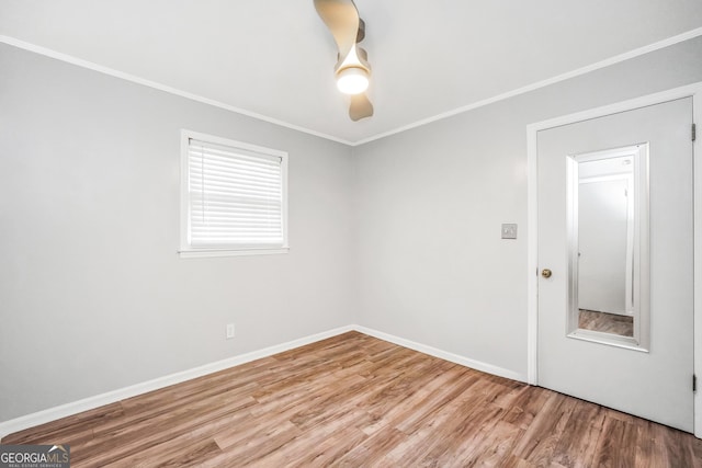 113 Fletcher Rd, Eatonton, GA 31024 - spare room with wood finished floors and ornamental molding