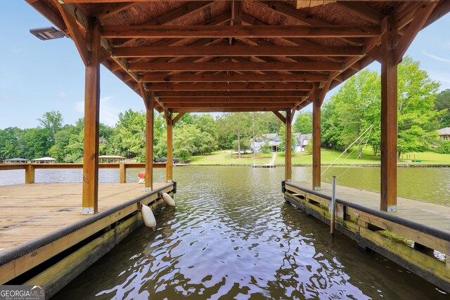 113 Fletcher Rd, Eatonton, GA 31024 - dock area with a water view and view of wooded area