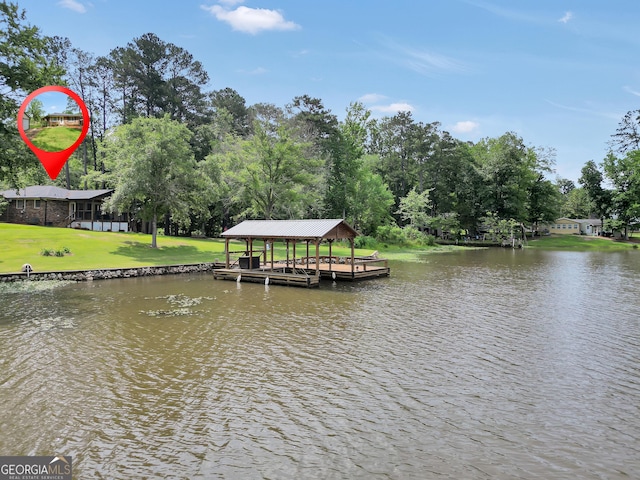 113 Fletcher Rd, Eatonton, GA 31024 - dock area with a water view, boat lift, a yard, and view of scattered trees