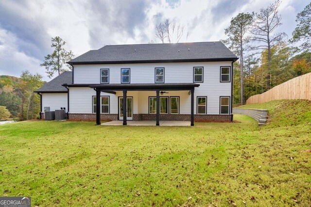 1387 Mineral Springs Rd, Hoschton, GA 30548 - back of property with a patio, a ceiling fan, and cooling unit