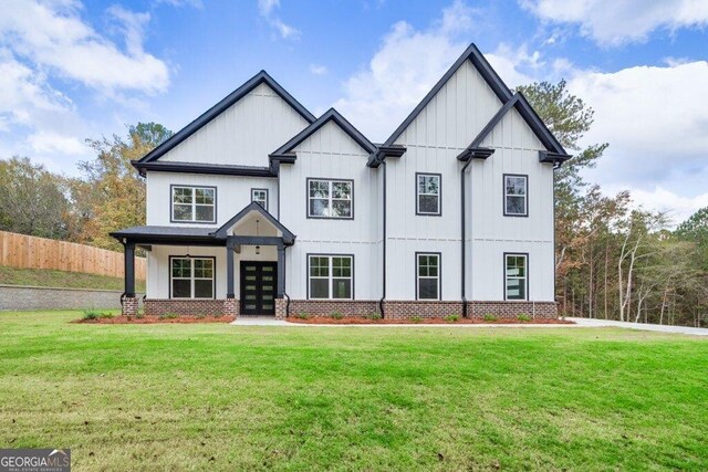 1387 Mineral Springs Rd, Hoschton, GA 30548 - modern farmhouse featuring french doors and board and batten siding