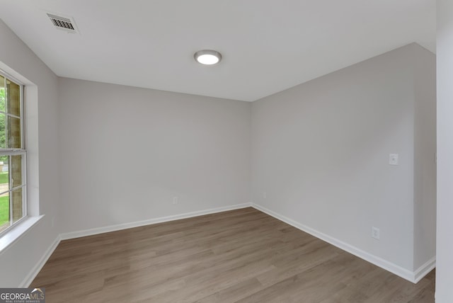 907 Brisley Cir, Hampton, GA 30228 - empty room with light wood-type flooring and baseboards
