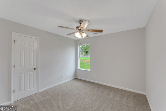 907 Brisley Cir, Hampton, GA 30228 - carpeted empty room with a ceiling fan and baseboards