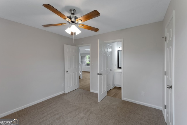 907 Brisley Cir, Hampton, GA 30228 - unfurnished bedroom with carpet floors, ensuite bath, and ceiling fan