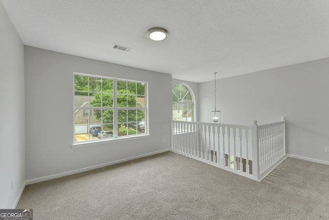 907 Brisley Cir, Hampton, GA 30228 - carpeted spare room featuring a textured ceiling