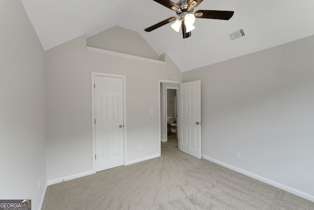 907 Brisley Cir, Hampton, GA 30228 - unfurnished bedroom featuring vaulted ceiling, carpet floors, and a ceiling fan