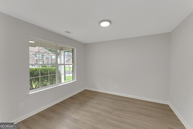 907 Brisley Cir, Hampton, GA 30228 - empty room featuring light wood finished floors and baseboards