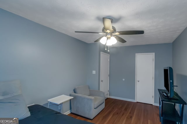 3823 Rock Hollow Ct, Conley, GA 30288 - living area with wood finished floors and ceiling fan