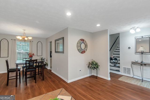 3823 Rock Hollow Ct, Conley, GA 30288 - dining area featuring stairway, wood finished floors, a chandelier, and recessed lighting