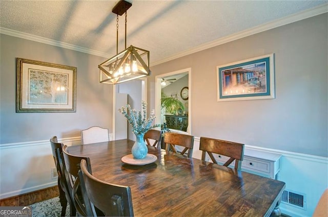368 Lambeth Dr, Hiram, GA 30141 - dining area with ornamental molding, wood finished floors, and a ceiling fan