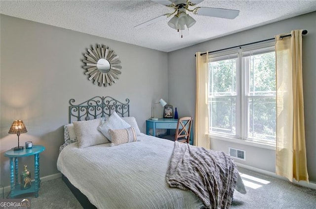 368 Lambeth Dr, Hiram, GA 30141 - bedroom featuring carpet, a textured ceiling, baseboards, and a ceiling fan