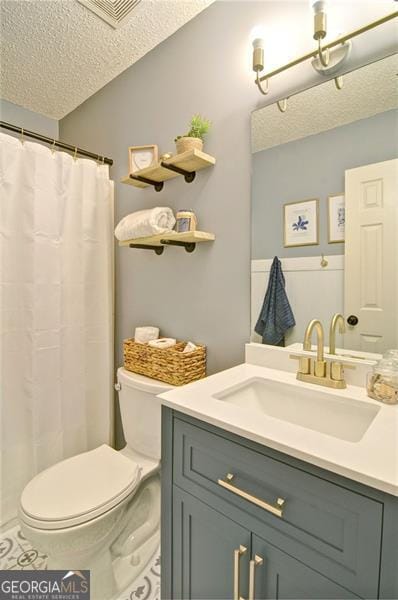 368 Lambeth Dr, Hiram, GA 30141 - full bath featuring a textured ceiling, toilet, vanity, and a shower with shower curtain