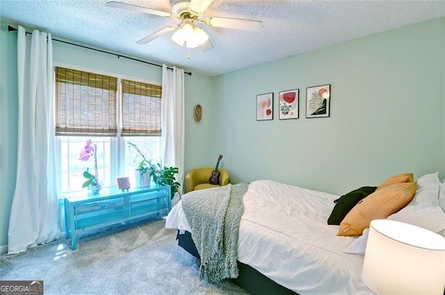 368 Lambeth Dr, Hiram, GA 30141 - bedroom featuring carpet flooring, a textured ceiling, and ceiling fan