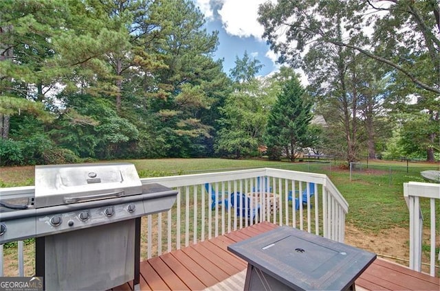 368 Lambeth Dr, Hiram, GA 30141 - deck featuring a grill, a yard, and view of scattered trees