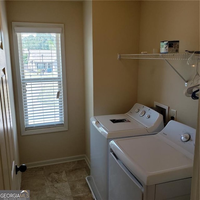 1030 Glenwyck Dr, Braselton, GA 30517 - laundry room featuring washer and clothes dryer and baseboards